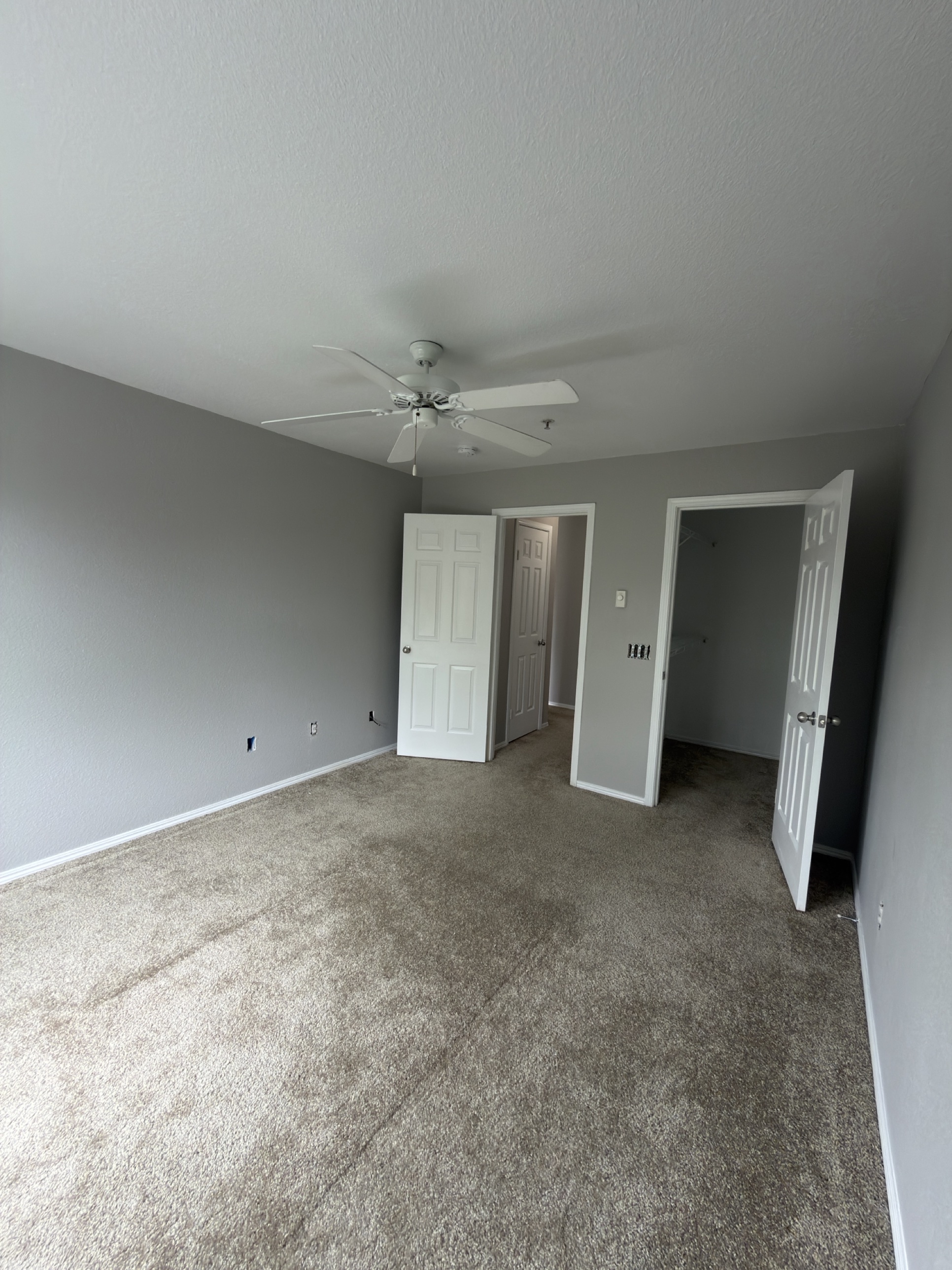 Repainted room with walk-in closet